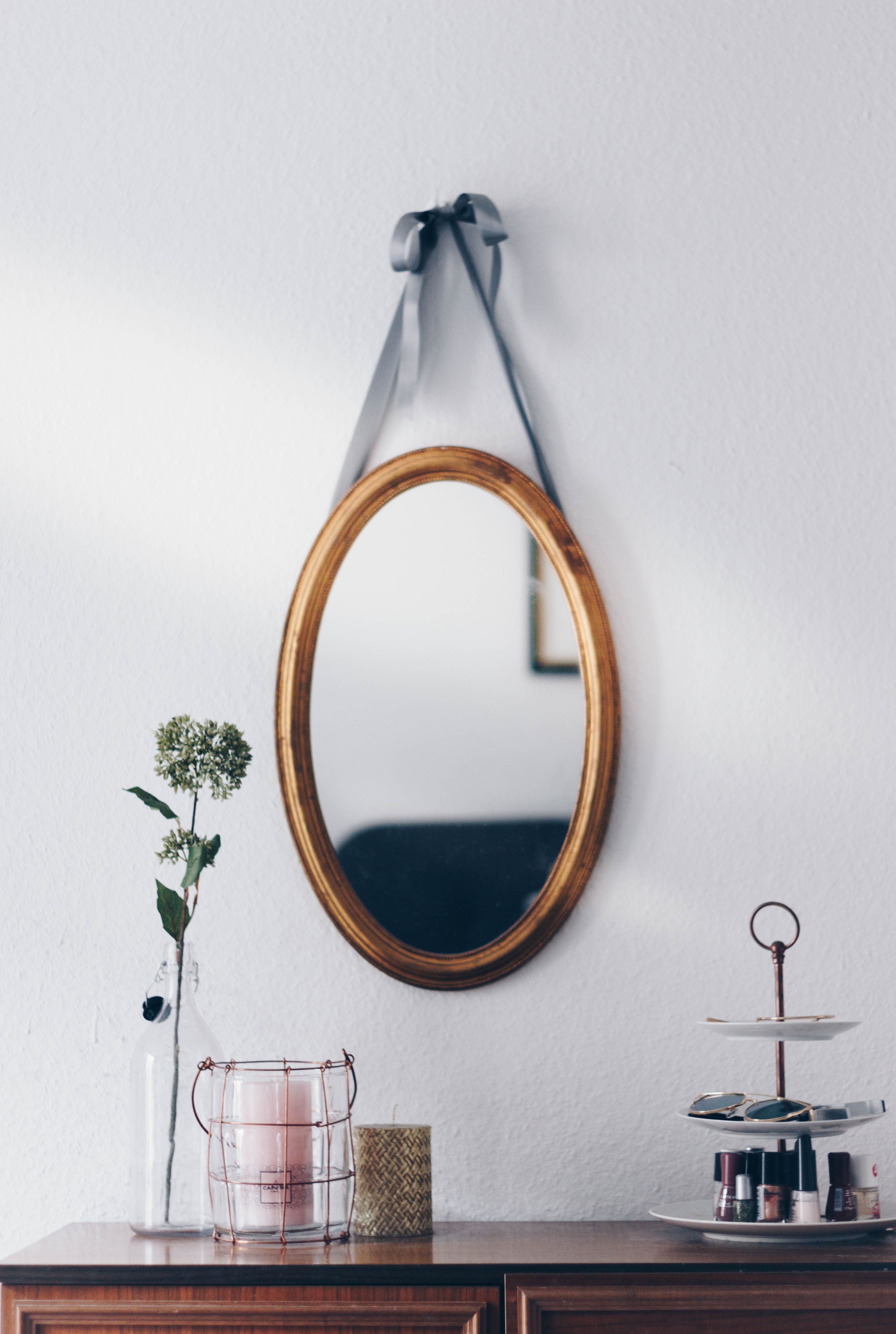 hanging mirror on wall